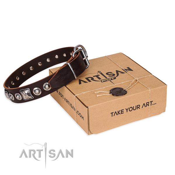 Genuine leather dog collar made of gentle to touch material with strong hardware